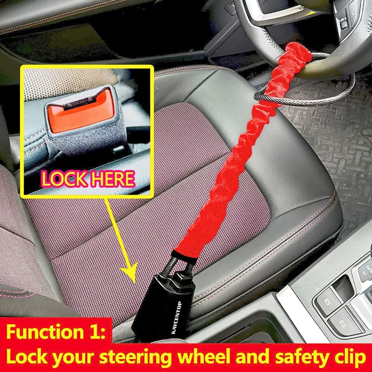 Red steering wheel wire rope anti-theft lock attached near seatbelt buckle area in car