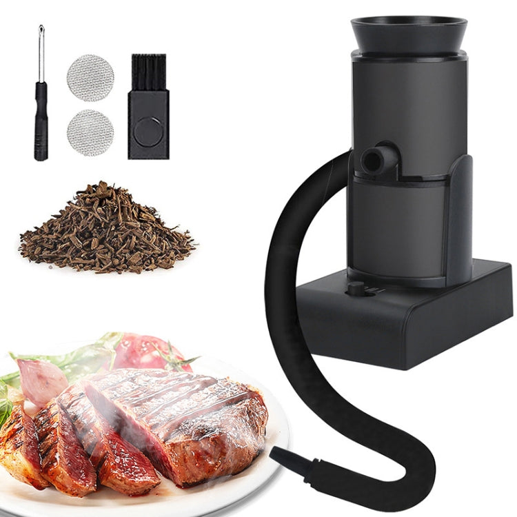 Black handheld smoke maker with cylindrical top, black base and curved hose, meat tray