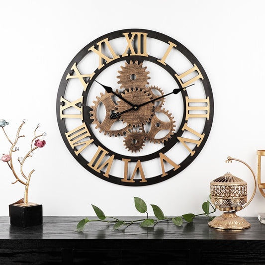 Roman numeral round wall clock with golden gear accents and black frame