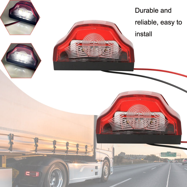 Pair of red LED license plate lamps with black base, clear lens insert, and attached wire leads