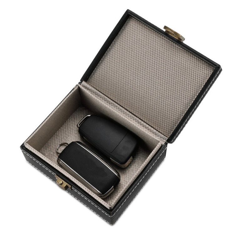 Open RFID shielding key box with textured lining holding two key fobs