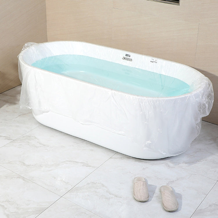 Disposable bathtub liner, white plastic cover fitted over an empty soaking tub