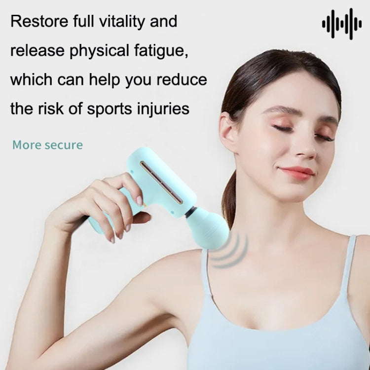 Blue mini handheld vibration massager gun used on shoulder, hand-held