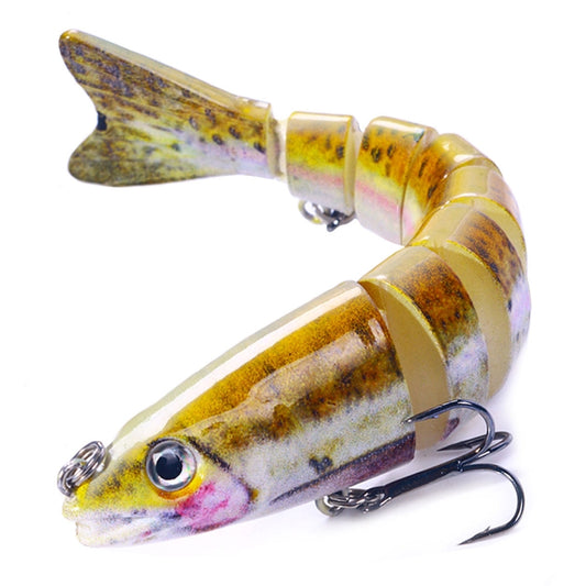 Multi-section fish minnow lure with treble hooks, segmented yellow-gold and purple pattern