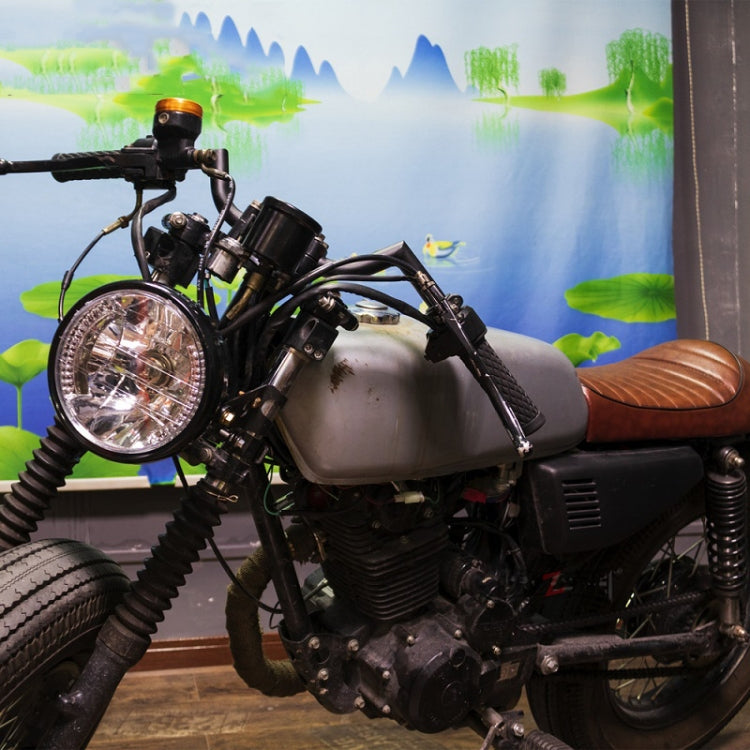 Motorcycle with 7-inch LED headlamp mounted on the front
