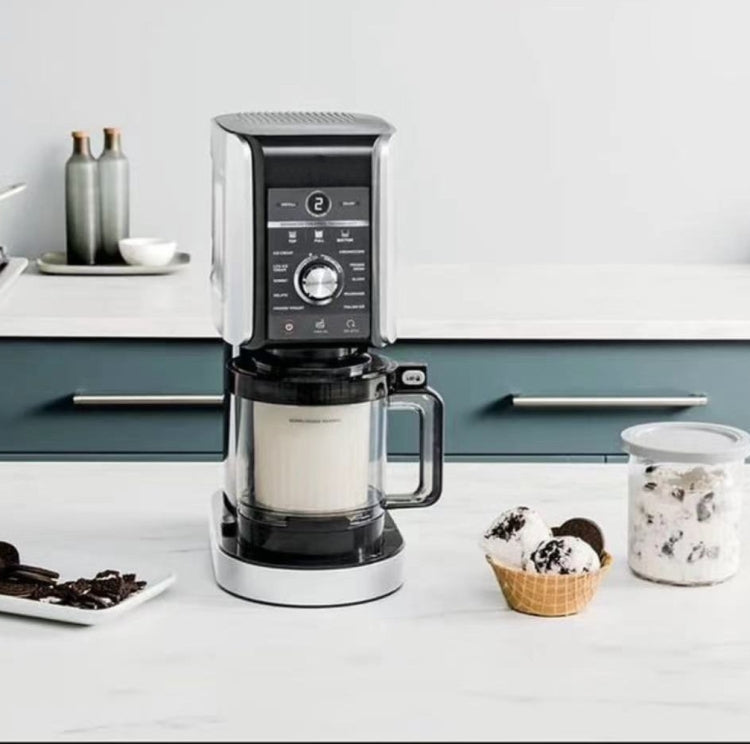 Ice cream storage cup with gray lid next to a coffee maker
