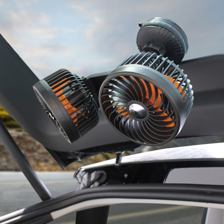 Vehicle-mounted double-head suction cup fan with two black fan heads and orange accents