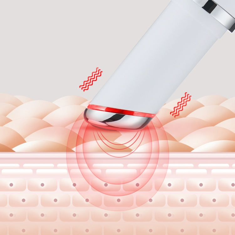Eye massage pen applying heat to eye area, with red vibration glow