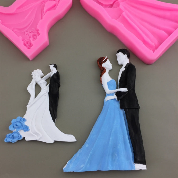 Bride and groom silicone mold cavity with two couple figurines in white and black