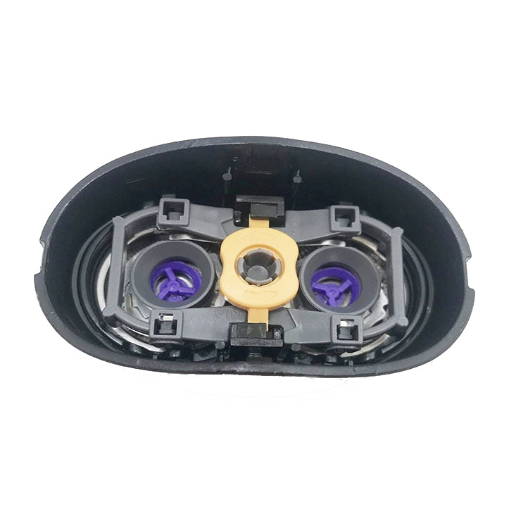 Philips shaver cutter head underside with three units: gold center and purple caps
