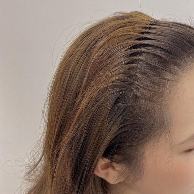 Invisible metal hair comb pin headband securing hair at the crown
