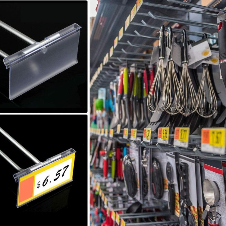 Clear price label strip holders on store display with yellow tags