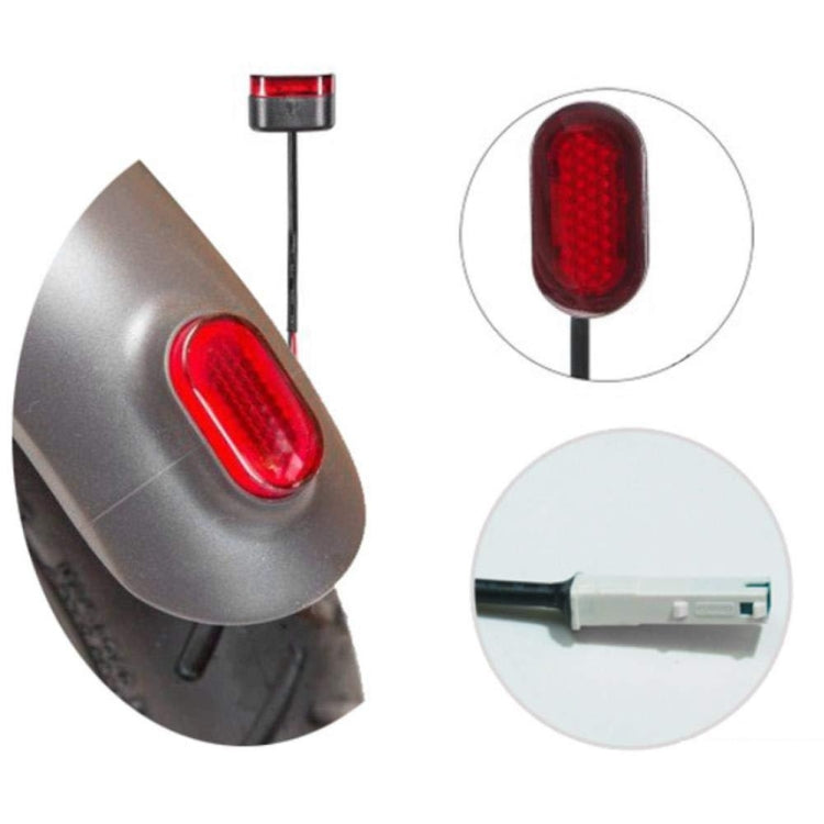 Rear tail light buckle with red lens detail and mounting post