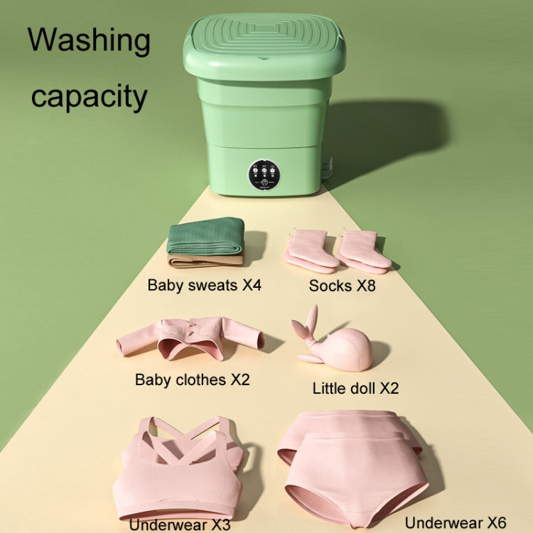 Light green portable folding washing machine with sample laundry items