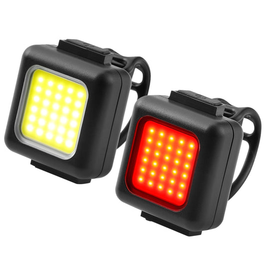 Pair of black bike lights: yellow headlight and red taillight with square COB lenses