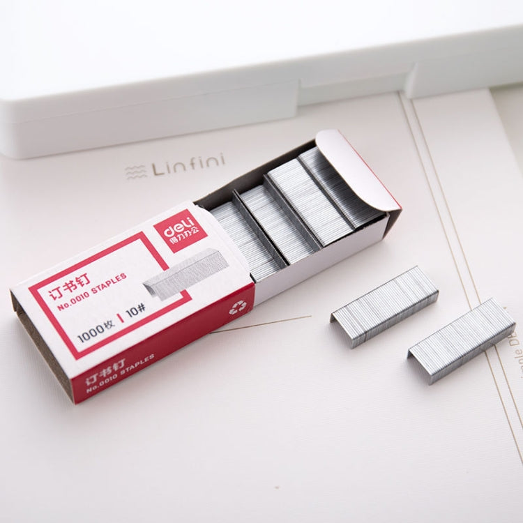 Staples drawer set with 1000-count box and loose silver-gray metal staples