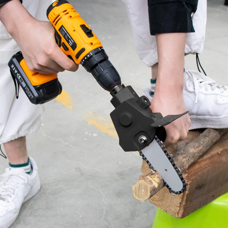 Electric pruning chainsaw attachment mounted on yellow drill while cutting wood