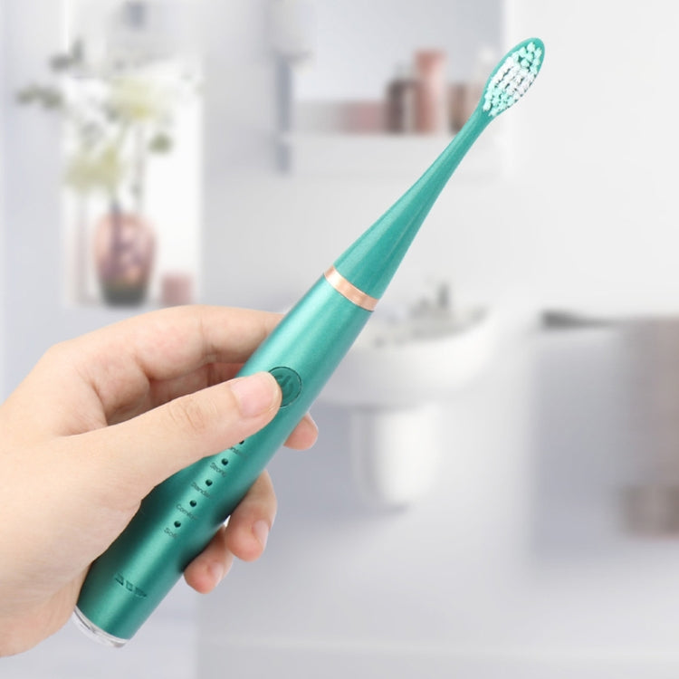 Teal electric dental scaler toothbrush head attachment with soft bristles