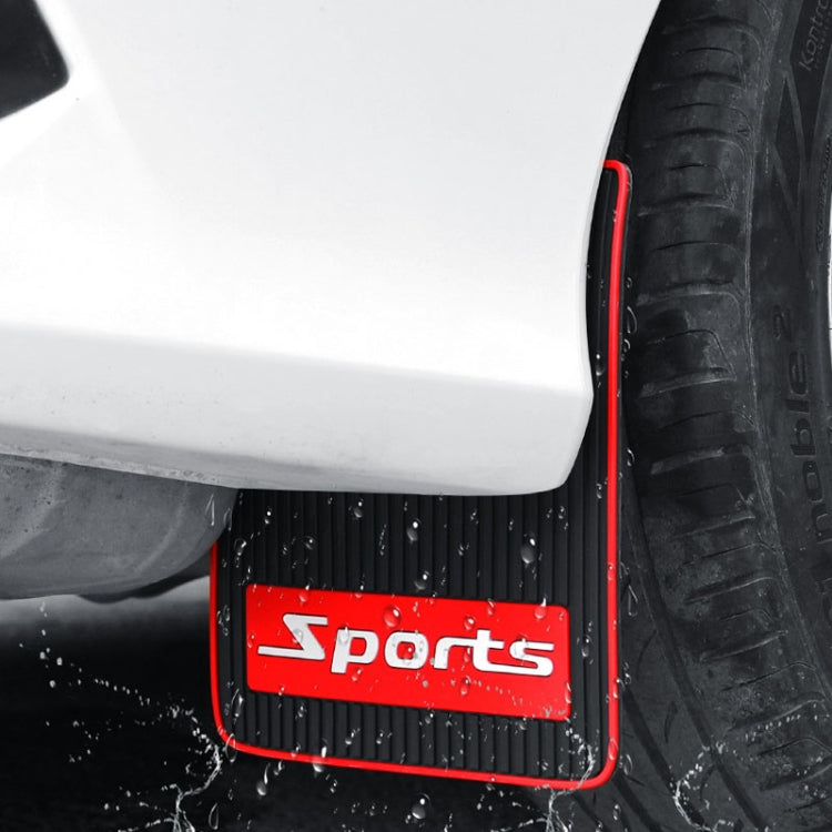 Close-up of installed black mud flap with red border and Sports logo on tire area