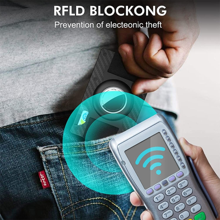Aluminum card holder with circular AirTag compartment attached to jeans, RFID protection