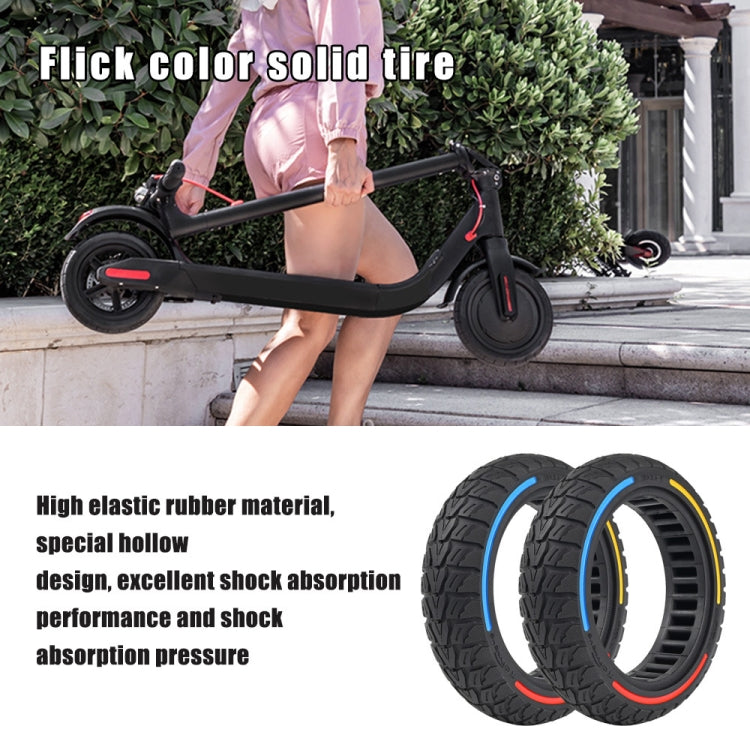 Pair of off-road scooter tires, black tread with blue and yellow accent stripes