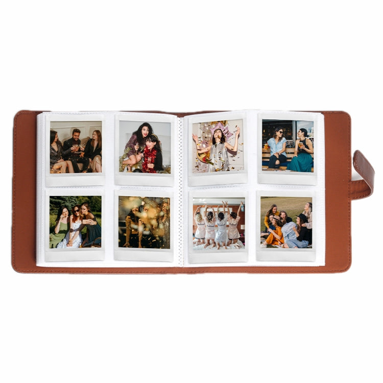 Opened brown photo ticket bank storage book with photo slots and white pages
