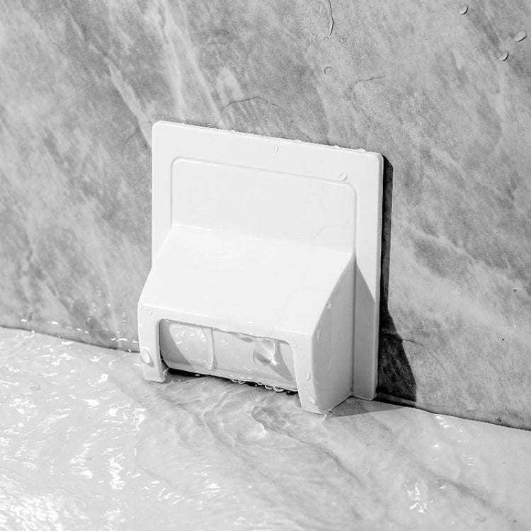 White wall-mounted toilet drain baffle with open front, splashes around base