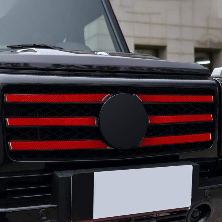 Vehicle front grille with installed red carbon-fiber decorative slat sticker set