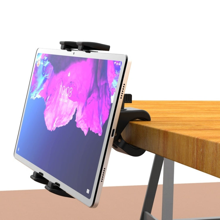 Tablet securely held in a black bicycle handlebar phone holder mount