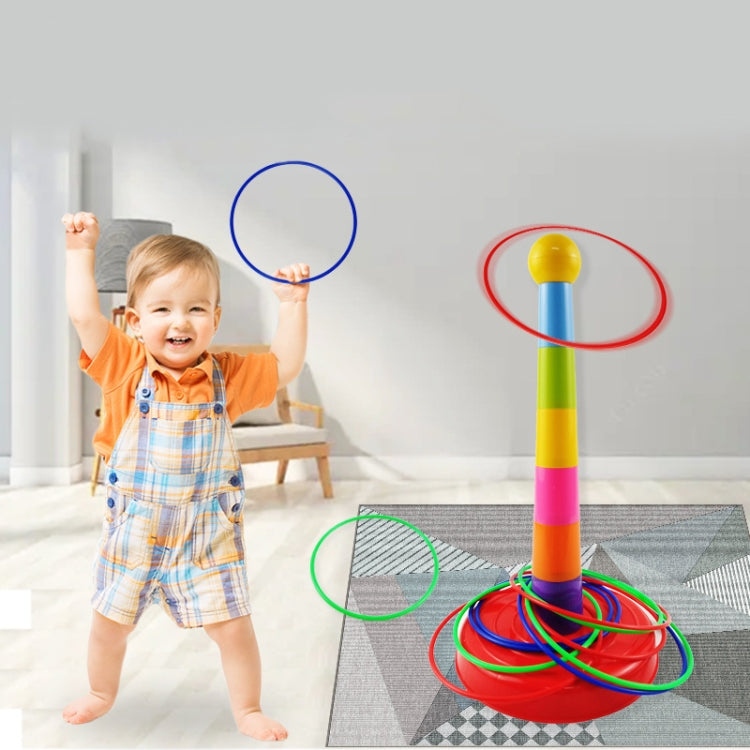 Stack-and-throw hoop toy set with tall striped peg tower and loop rings