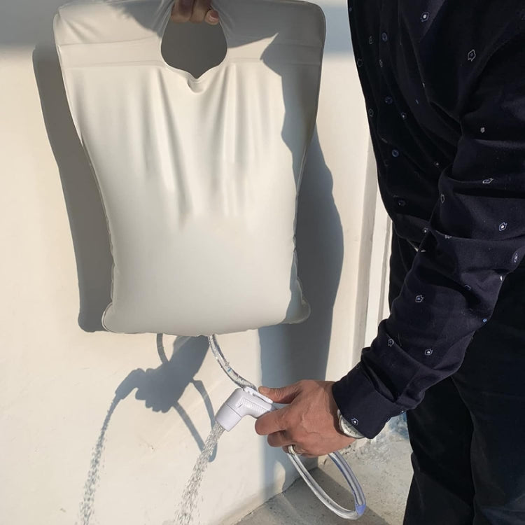 Outdoor portable shower water bag with connected hose and outlet valve