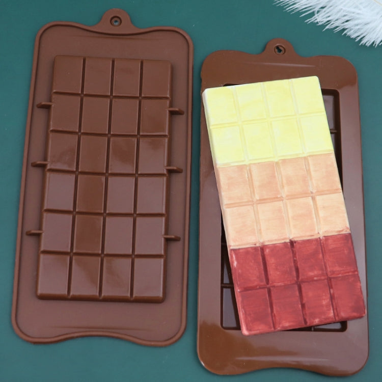 Silicone chocolate block moulds filled with assorted chocolate bars, brown and light colors