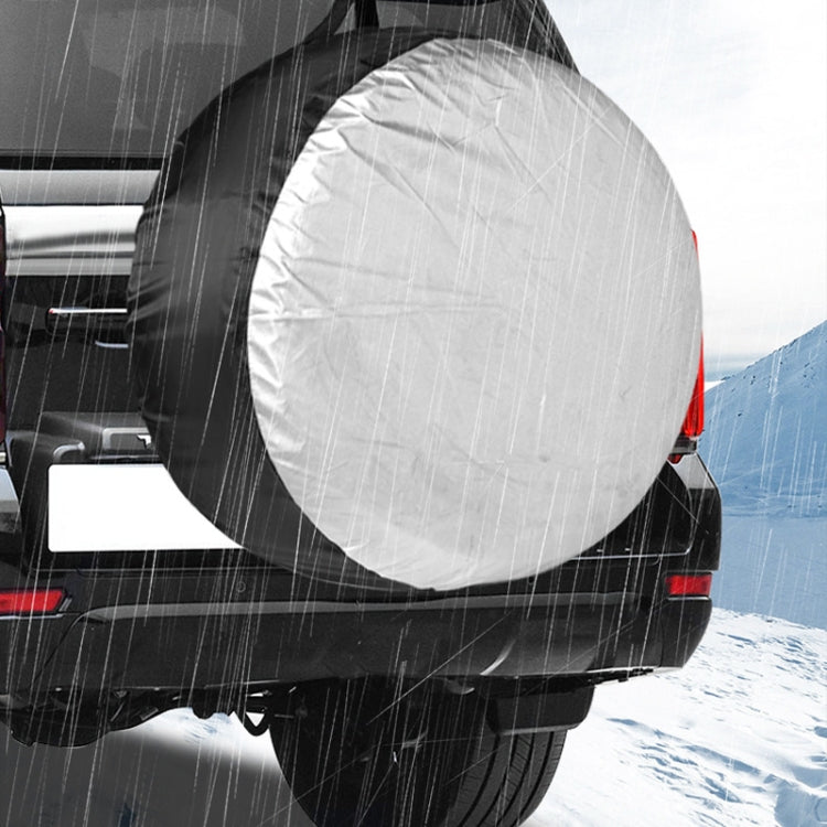 White round tire cover placed on a car’s rear wheel