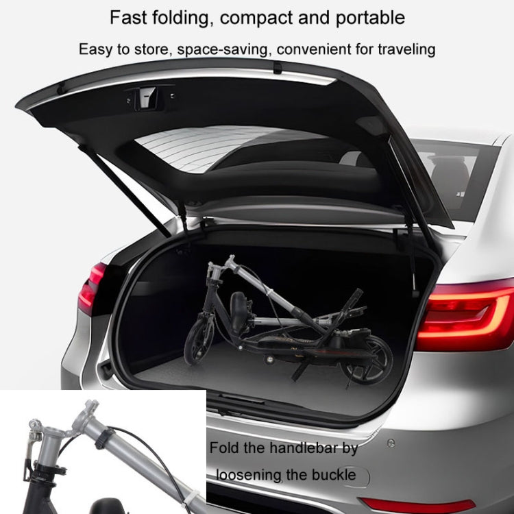 Folded two-wheel mobility scooter parked compactly in a car trunk, black frame