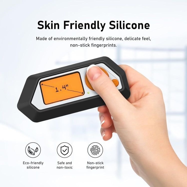 Black silicone case corner with finger on orange control button and port opening