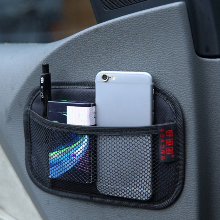Black car sticky storage net bag with mesh pockets holding phone and cards