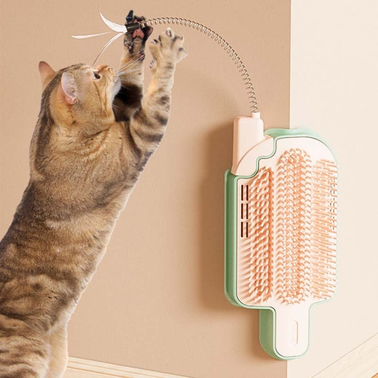 Pet massage brush toy on wall, mint and white with curved bristle pad