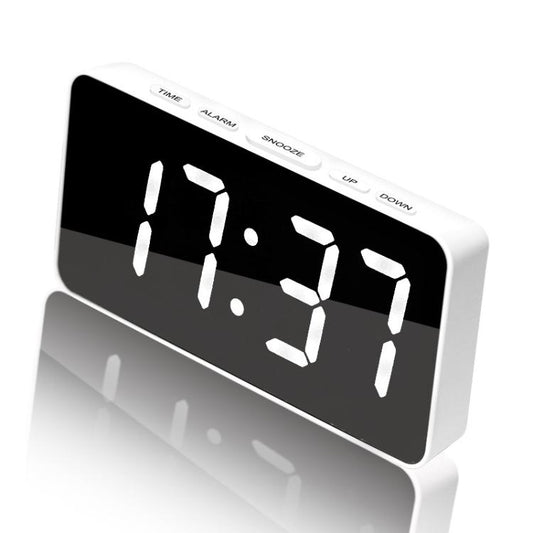 White LED digital alarm clock with black display and white 7-segment time digits