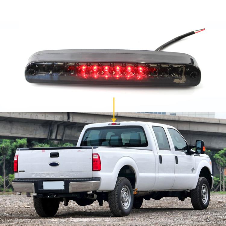 LED high mount brake light installed on pickup truck rear, red LEDs illuminated