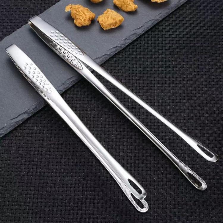 Two stainless steel barbecue tongs with perforated gripping ends and loop handles