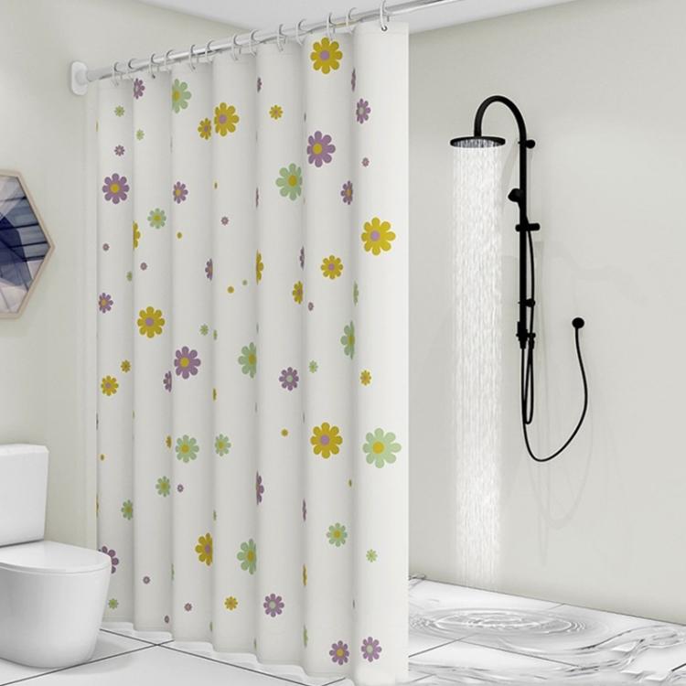 White shower curtain with multicolor flower print hanging in a bathroom shower