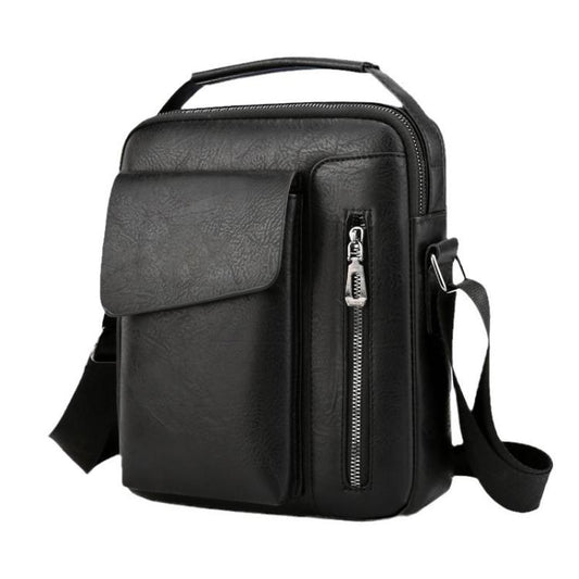 Men's vintage crossbody shoulder bag in black with flap front and vertical zipper pocket