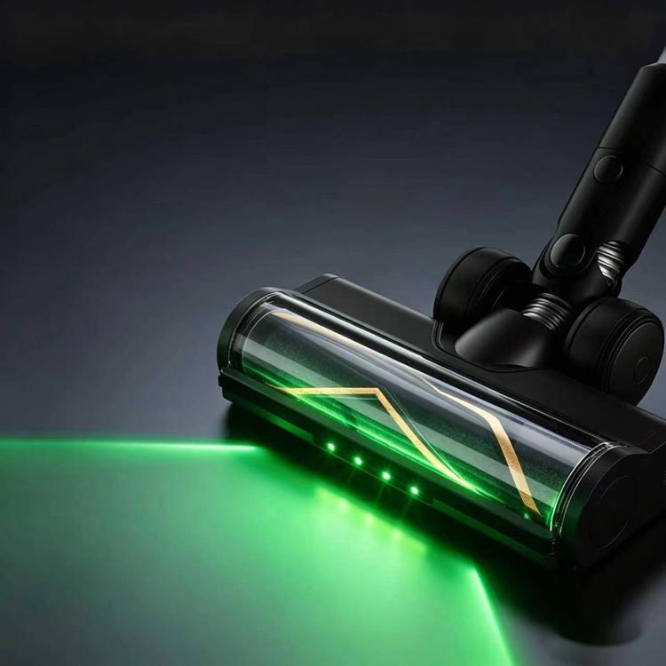 Motorized floor brush head with green LED glow and clear roller drum close-up