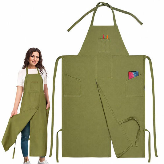 Green split-leg canvas work apron with halter neck, front pockets, and leg straps