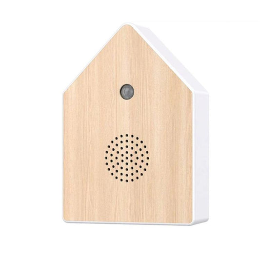 Motion-sensing birdhouse with wood-grain finish, circular speaker holes and dark sensor button