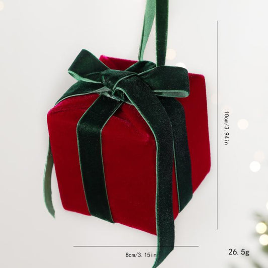 Wine red velvet plush gift box ornament with dark green ribbon bow and hanging loop