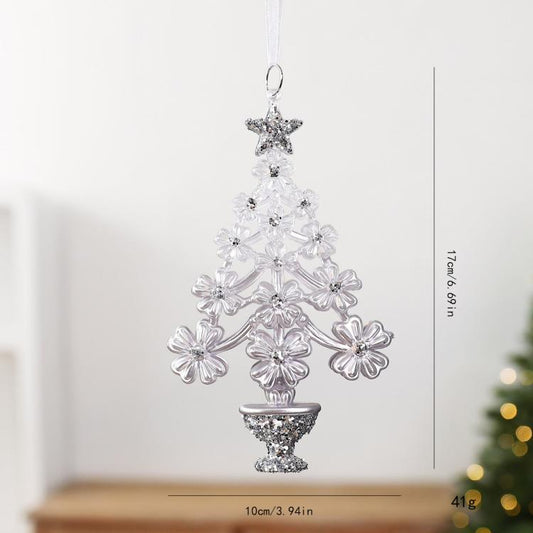 Rhinestone Christmas tree ornament with star top and flower garland details, silver-toned.