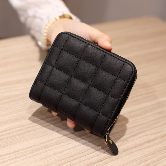 Black quilted mini wallet/coin purse with short zipper and gold-tone zipper pull