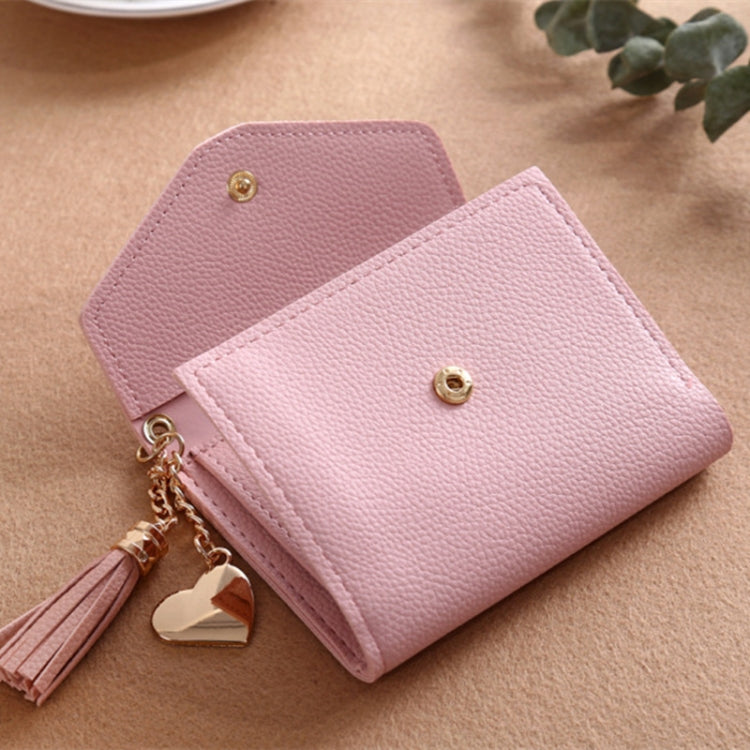 Pink textured leather mini wallet with heart tassel charm and snap clasp