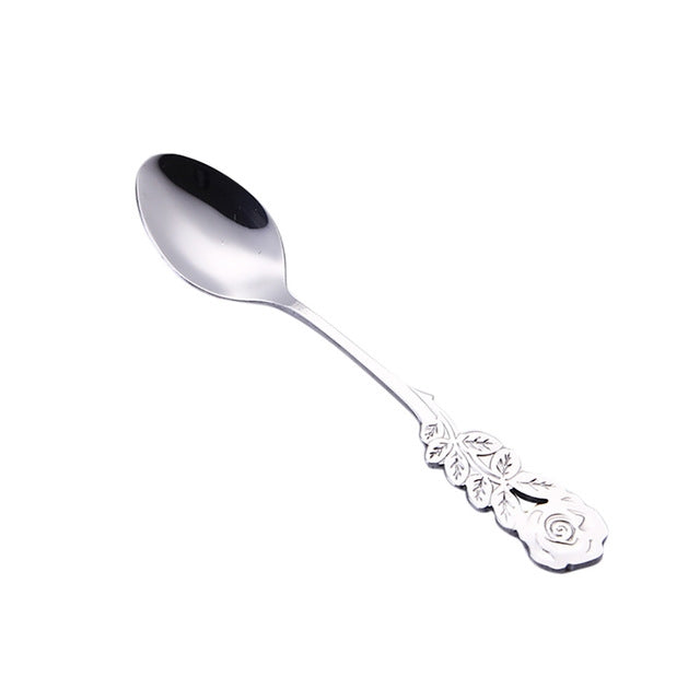 Silver stainless steel coffee spoon with rose-pattern handle, long stem